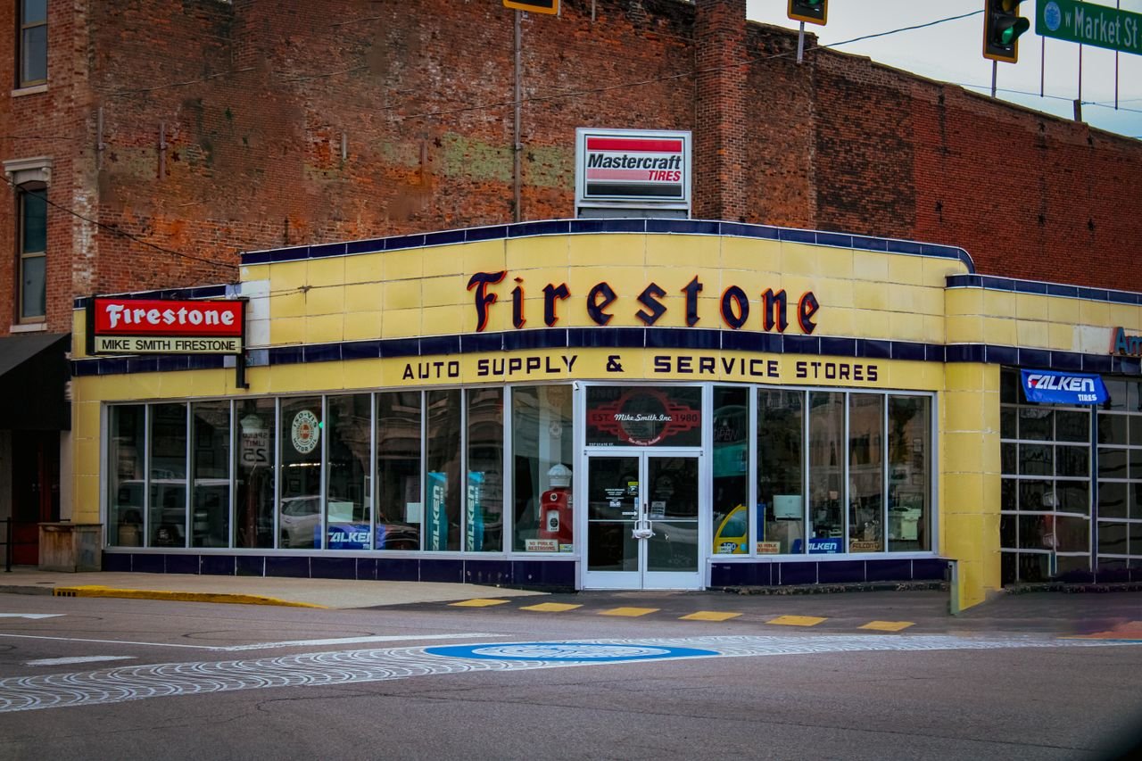 social-feed-img-04 Vintage Firestone store in historic New Albany, featuring classic architecture.